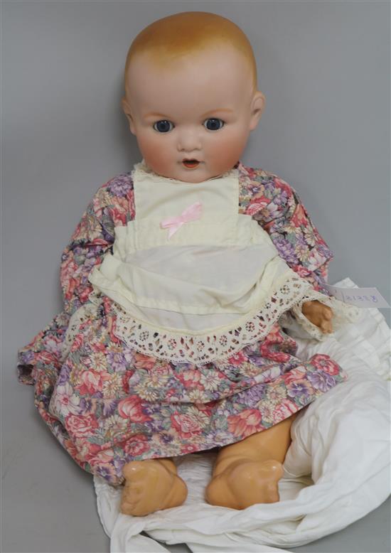 A German bisque headed A M doll 518/9K
